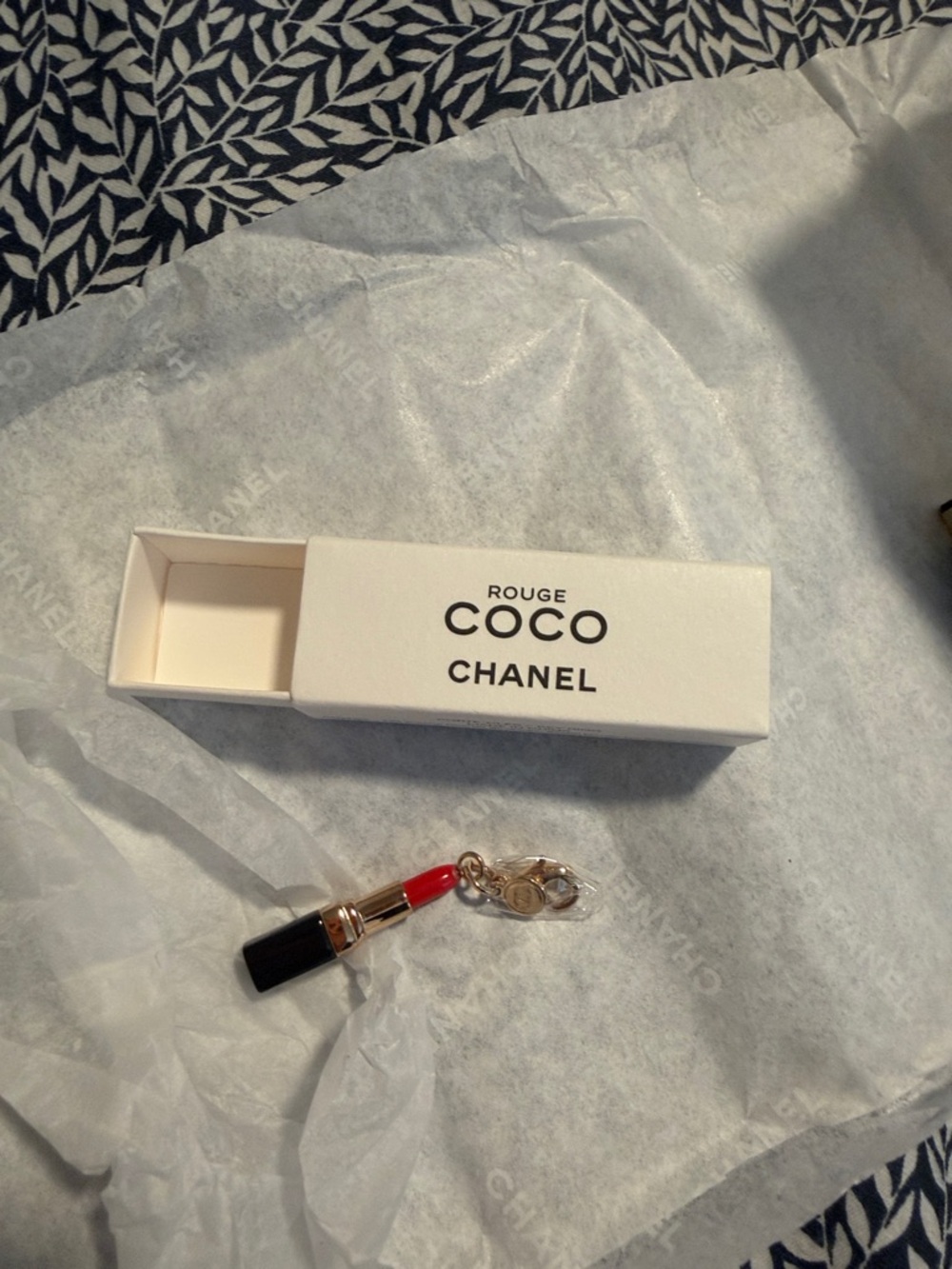 CHANEL Red and Black Lipstick Charm Keychain with Gold Hardware